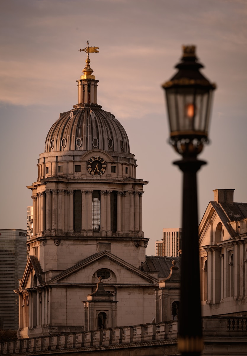 A large building with a clock on the top of it
